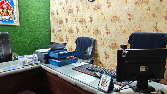 Document processing workstations at the Harsiddhi Services office, Vadodara